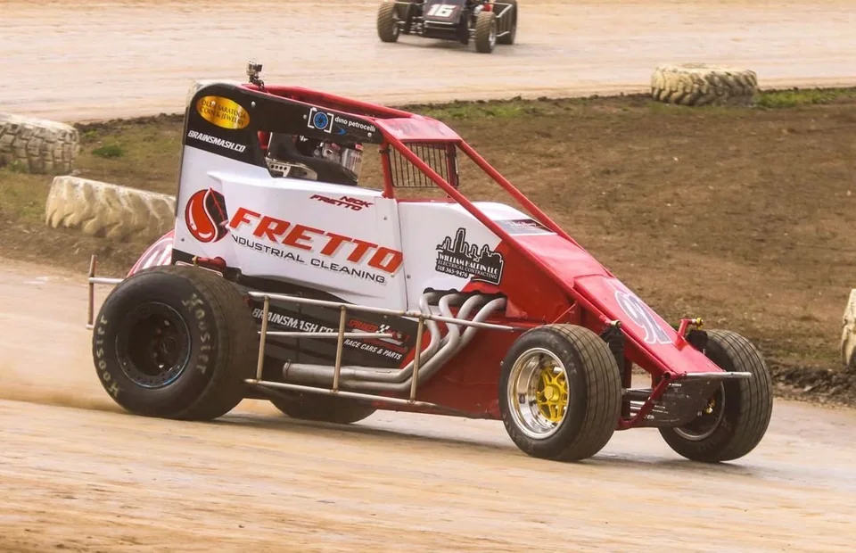 Dirt racing. In motion.